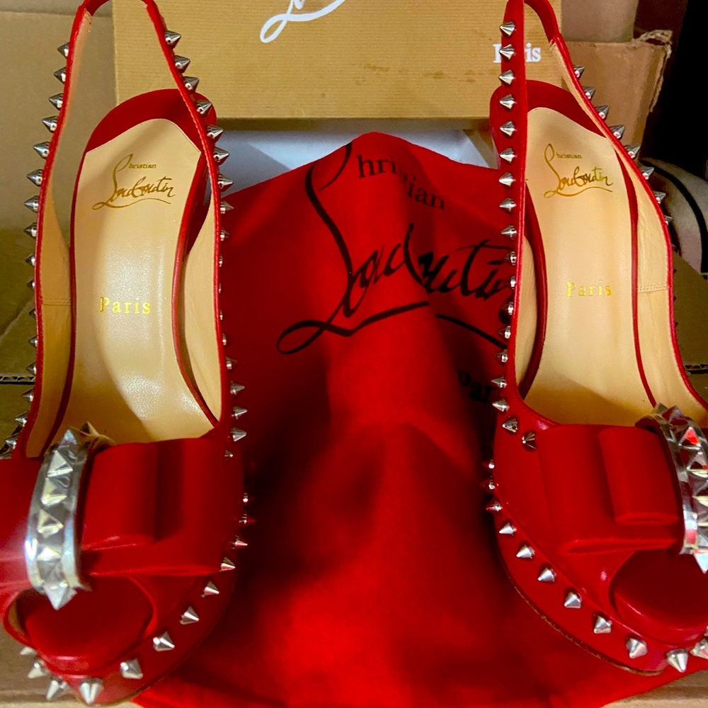 Red Lady Clou Sling back. Never worn 100% Authentic
